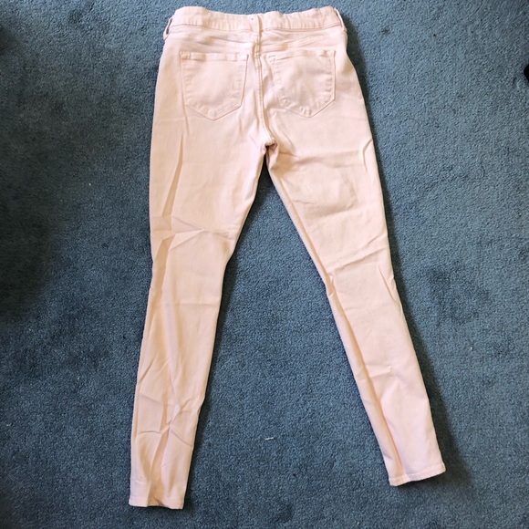 Light pink lightly worn torn jeans - Picture 2 of 3